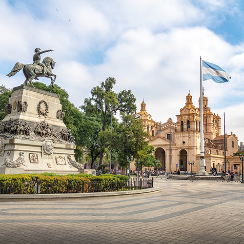 Plaza 25 de Mayo in Córdoba Argentina with the equestrian statue of General Manuel Belgrano and the Córdoba Cathedral in the background