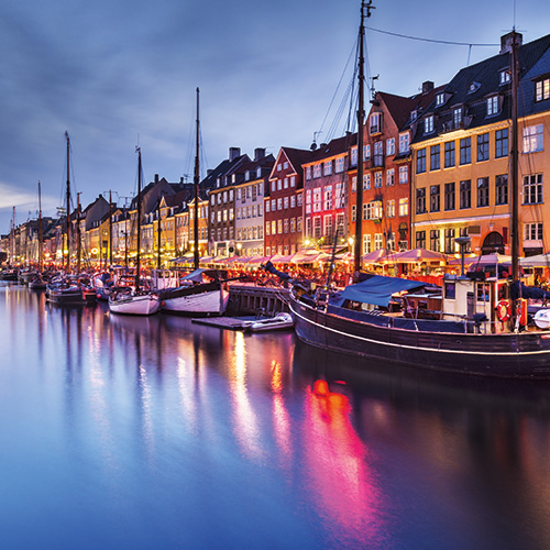 A stunning image of Nyhavn, Copenhagen, Denmark at dusk