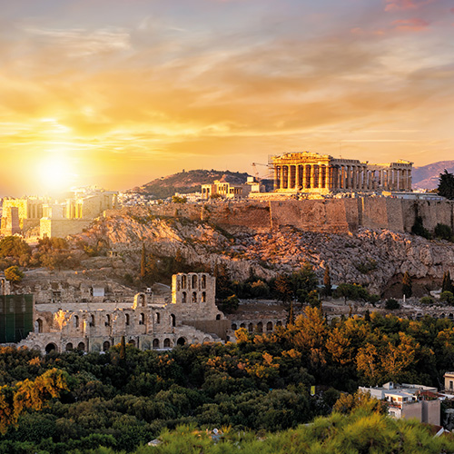 A panoramic view of the Acropolis of Athens Greece at sunset