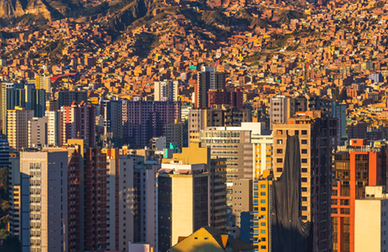 A view of the La Paz, Bolivia, with its densely populated cityscape and dramatic mountain backdrop