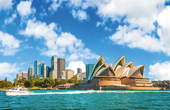 A panoramic view of the iconic Sydney Opera House and skyline