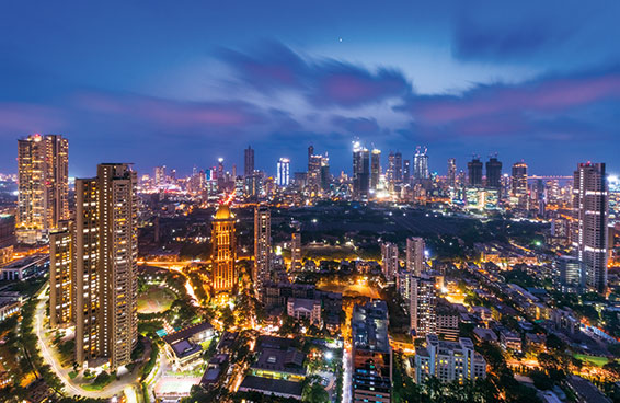 A panoramic view of the vibrant night skyline of Mumbai