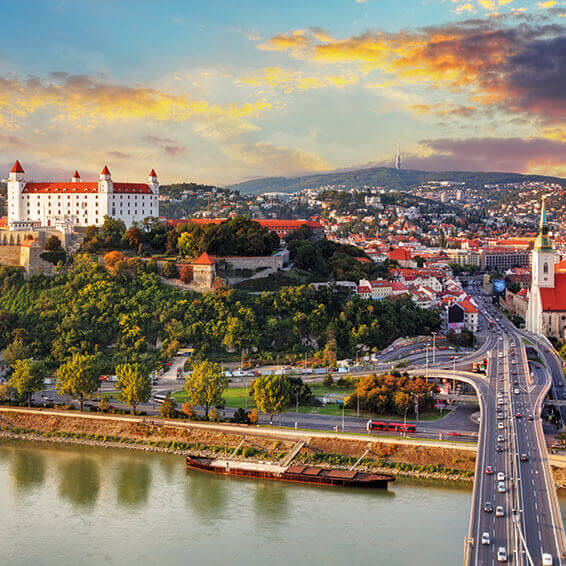 A shot of Bratislava Castle at sunset, overlooking the Danube River