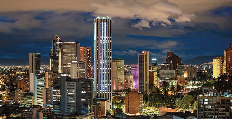 A panoramic view of Bogotá Colombia with the Colpatria Tower at night