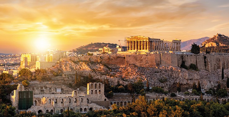 A panoramic view of the Acropolis of Athens Greece at sunset