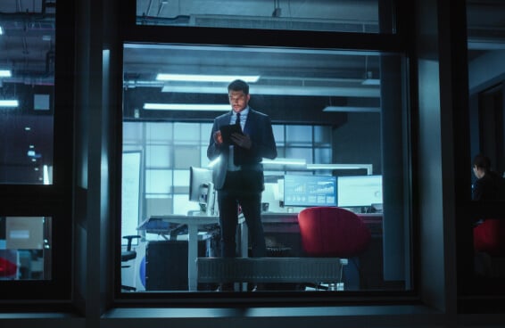 Businessman Working on a Digital Tablet Computer in the Office